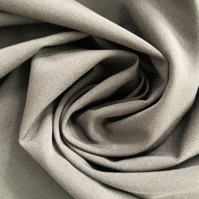 92% de poliéster 8% de tela de spandex material Jacquard Pearl Dot Cuatro caras pantalones de playa elásticos tela