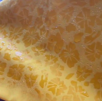 Tejido de piel de durazno de poliéster 100% para pantalones de playa florales expuestos al agua
