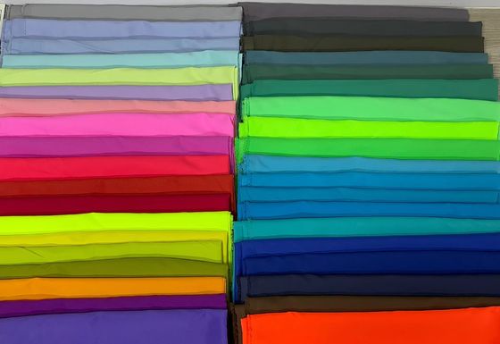 Pantalones de playa de terciopelo de piel de melocotón impermeable Tejido para ropa de playa de lujo de alto rendimiento